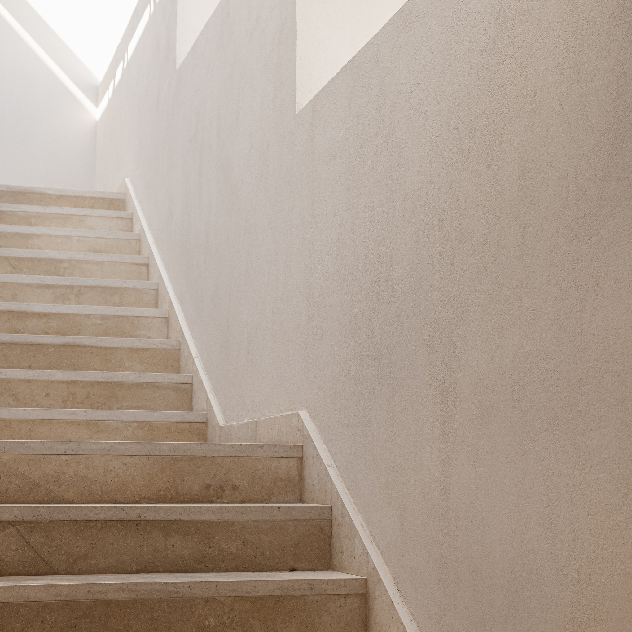 Modern Building with Beige Wall and Stairs 